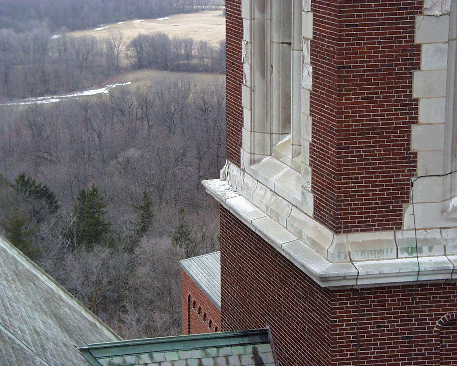 Holy Hill masonry restoration - West tower beltline spall